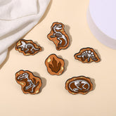 Pines de dinosaurios de dibujos animados